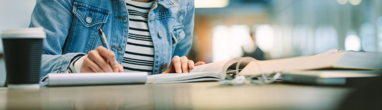 student studying and drinking coffee