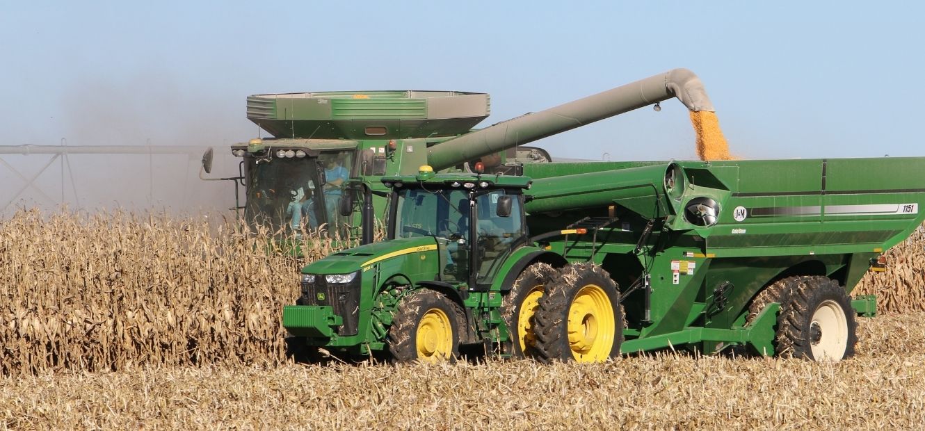 Combine and grain cart at harvest.