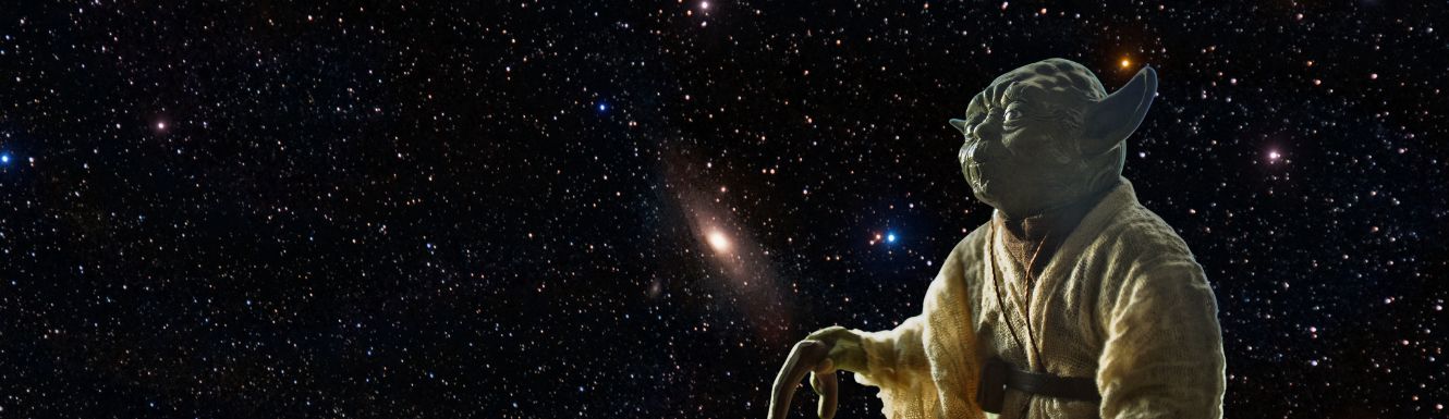 Yoda staring at stars in galaxy