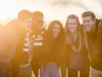 A group of teenagers laughing