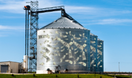 Grain bins with money inside them